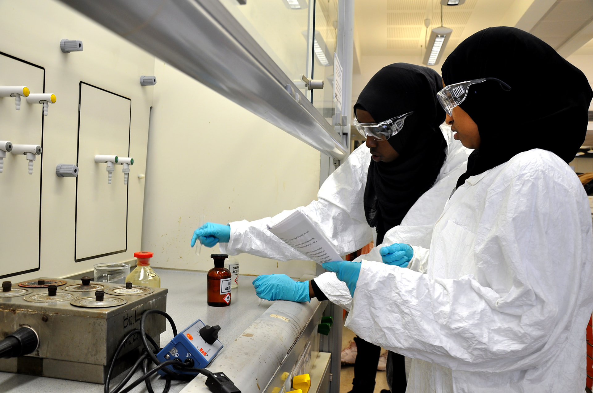 Young people working together on a hands-on project